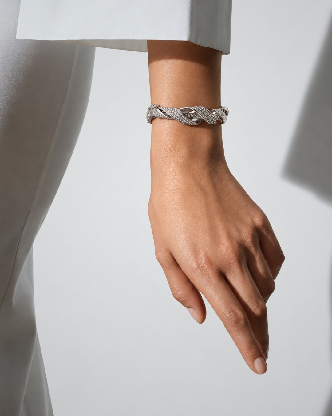 Diamond twist bangle worn on the wrist